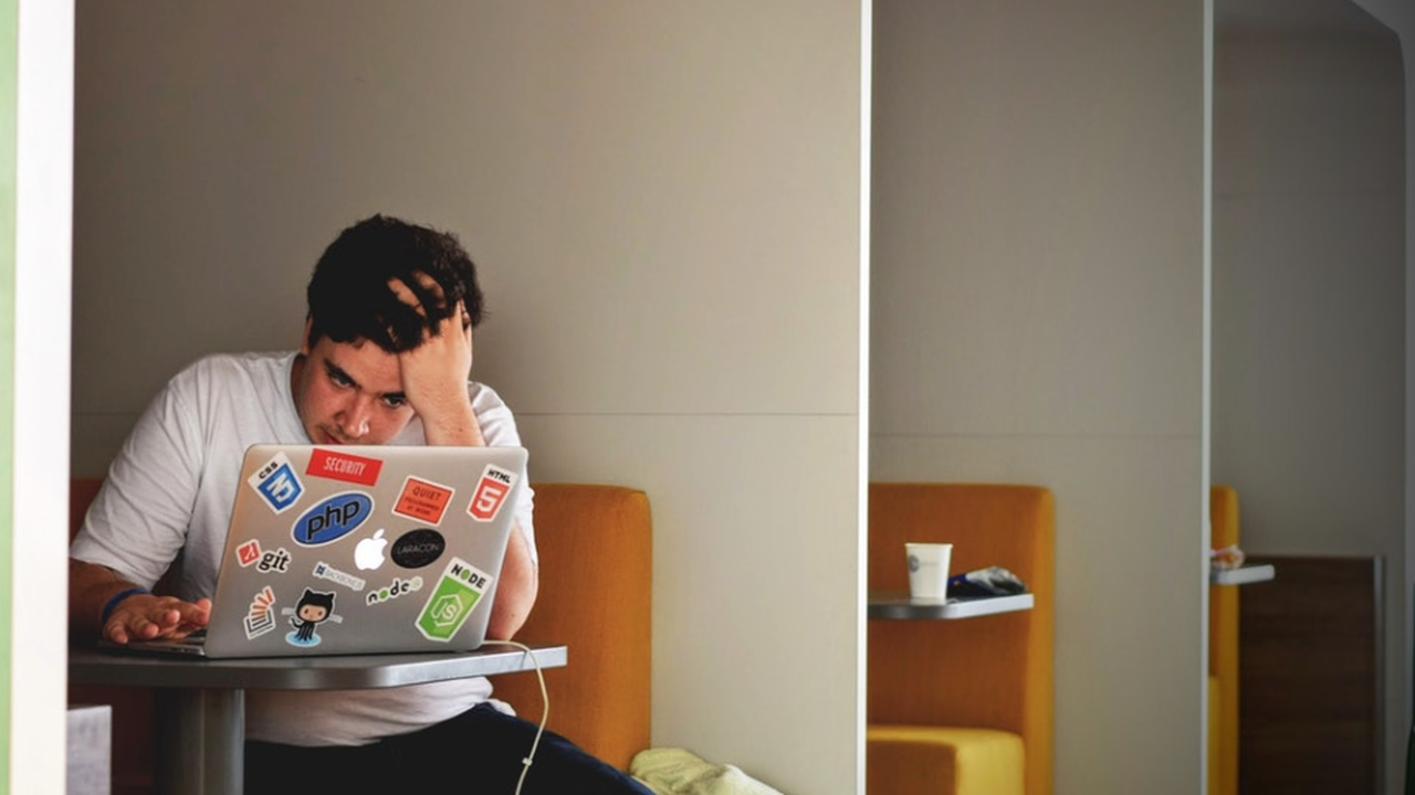 Stressed boy on the laptop