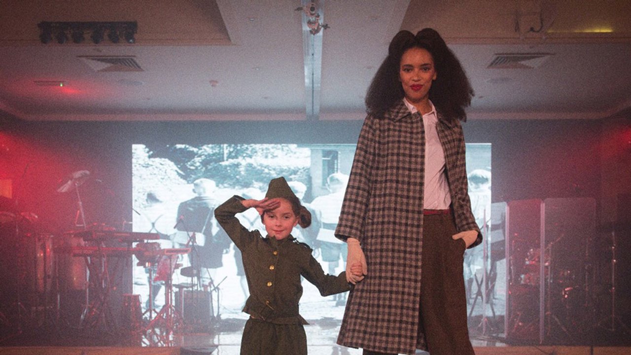 A mother and daughter taking part in the fashion show