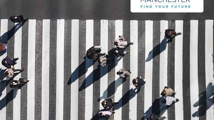 An ariel view of people walking in a city