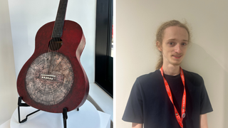 Student with his artwork