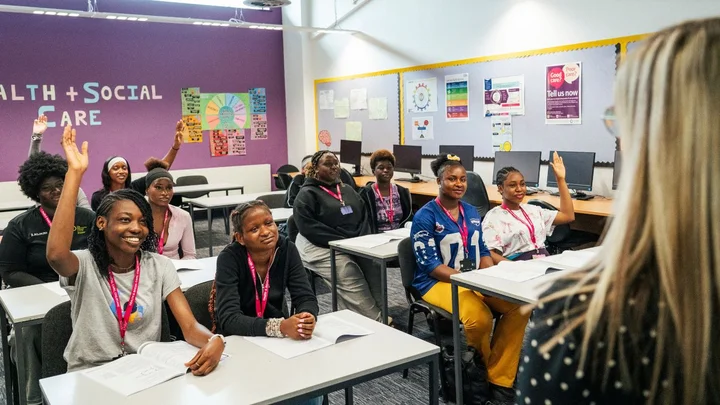 Health and Social Care students participating in a classroom discussion during a lesson at The Manchester College.