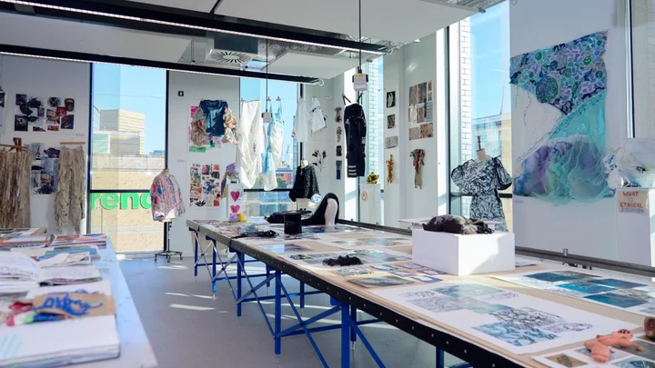 Fashion and textile design studio at The Manchester College City Campus Manchester displaying student garments, artwork, sketchbooks and creative project work.