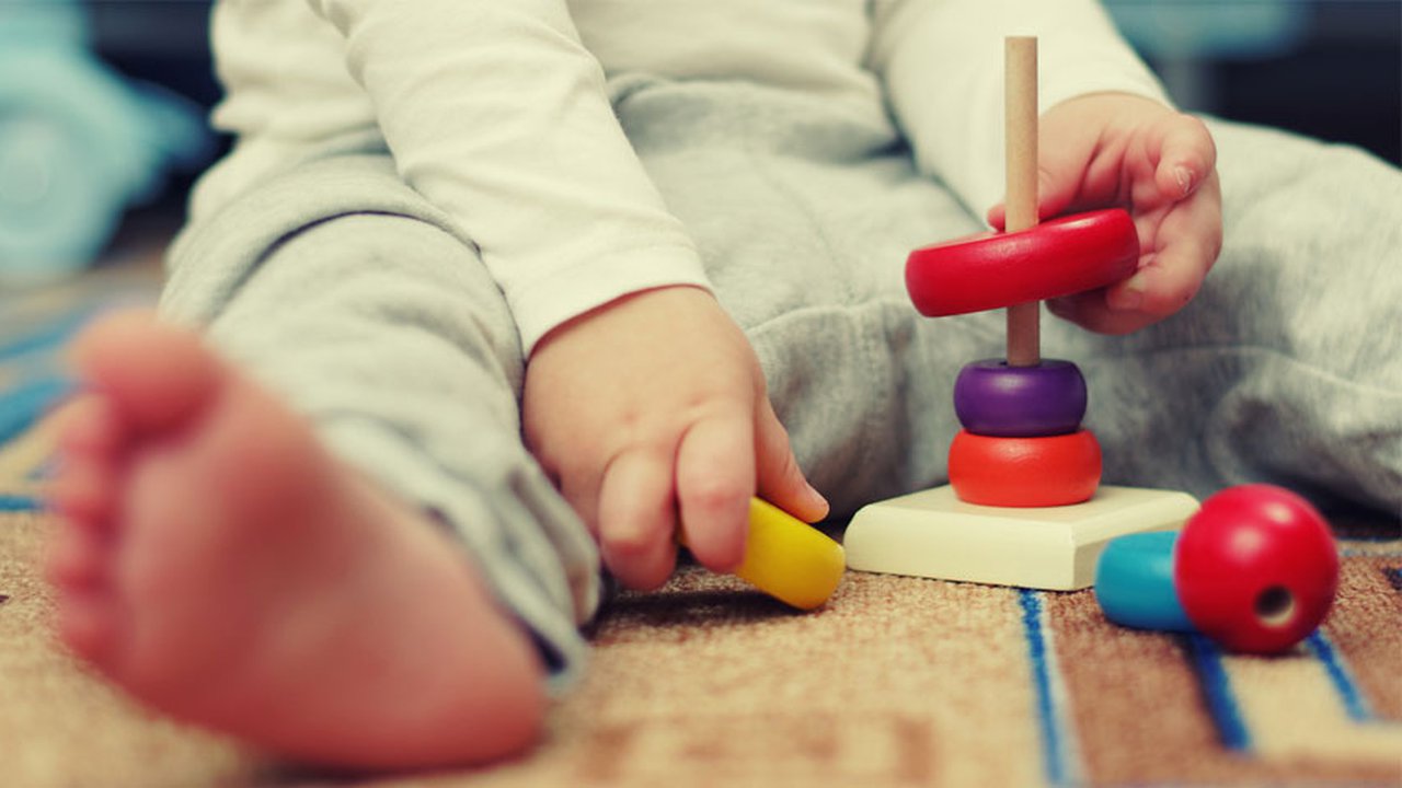 A child playing at nursery