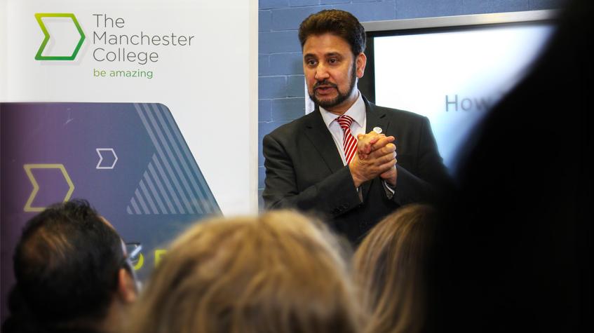 MP Afzal Khan talking to students